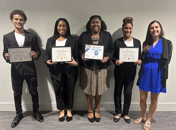 Participants of Making My Mark Event with certificates